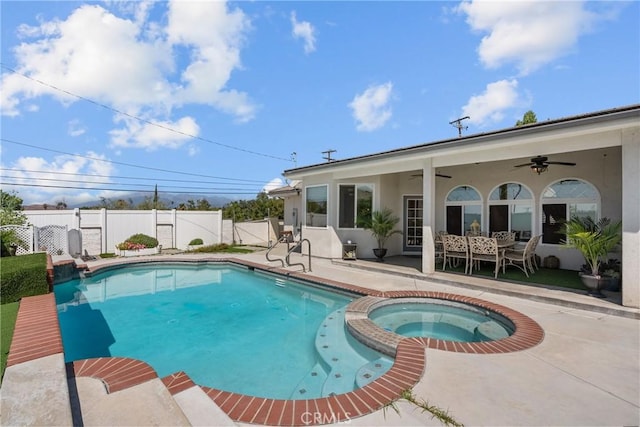 1403 Sonora St, San Bernardino, CA 92404 - view of pool featuring a pool with connected hot tub, a gate, a ceiling fan, fence, and a patio
