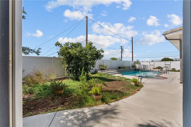 1403 Sonora St, San Bernardino, CA 92404 - view of swimming pool with a fenced backyard, a pool with connected hot tub, and a patio area