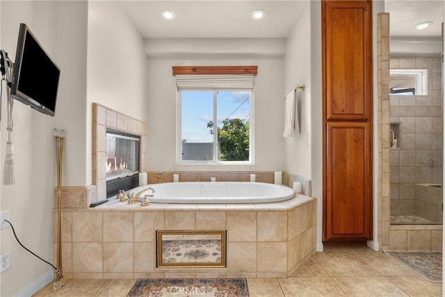 1403 Sonora St, San Bernardino, CA 92404 - full bath featuring tile patterned flooring, tiled shower, and a bath