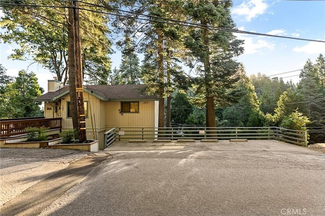 view of front of property featuring a chimney