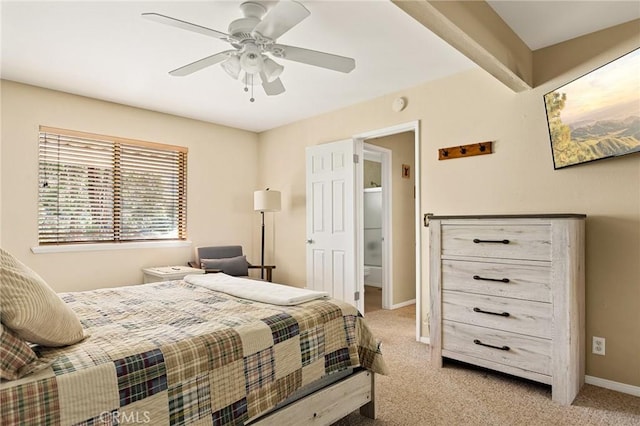 carpeted bedroom with a ceiling fan and baseboards