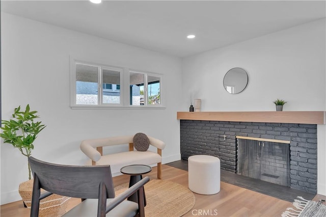 10525 S 5th Ave, Inglewood, CA 90303 - living room featuring baseboards, a fireplace, wood finished floors, and recessed lighting