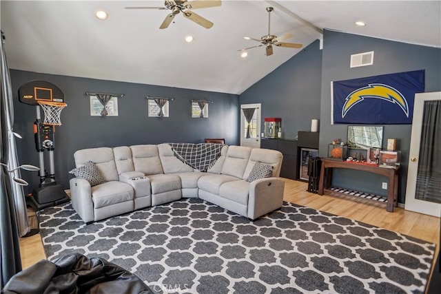 living room featuring visible vents, ceiling fan, recessed lighting, wood finished floors, and high vaulted ceiling