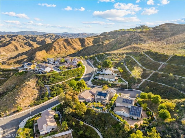 birds eye view of property featuring a mountain view and a residential view