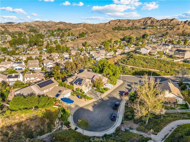 aerial view featuring a mountain view and a residential view