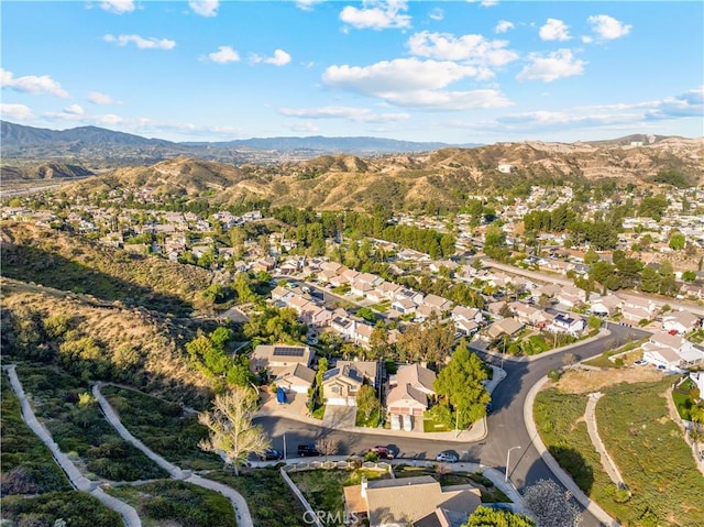 bird's eye view with a mountain view and a residential view
