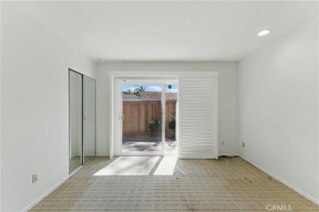 8292 Manifesto Cir, Huntington Beach, CA 92646 - empty room featuring carpet floors and baseboards