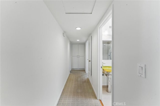 8292 Manifesto Cir, Huntington Beach, CA 92646 - hall featuring baseboards and recessed lighting