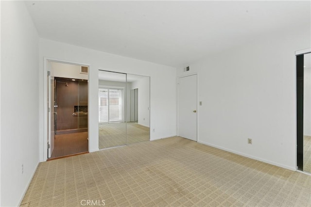 8292 Manifesto Cir, Huntington Beach, CA 92646 - unfurnished room with visible vents, baseboards, and carpet floors