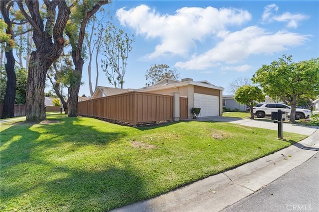 8292 Manifesto Cir, Huntington Beach, CA 92646 - view of home's exterior featuring concrete driveway, stucco siding, a garage, fence, and a lawn