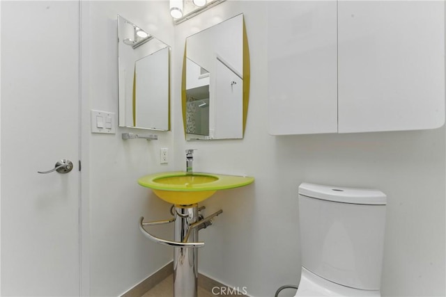 8292 Manifesto Cir, Huntington Beach, CA 92646 - bathroom featuring a sink and toilet