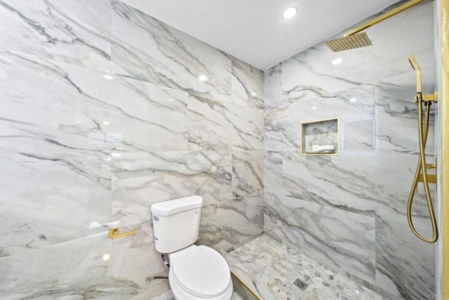 full bathroom with a marble finish shower, toilet, and recessed lighting