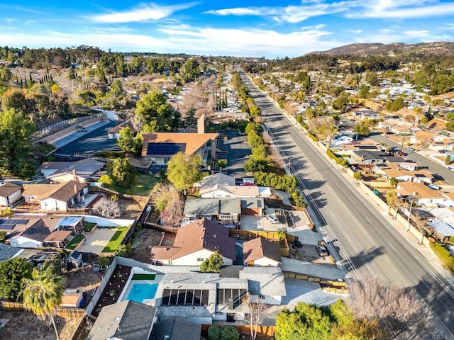 birds eye view of property featuring a residential view and a mountain view
