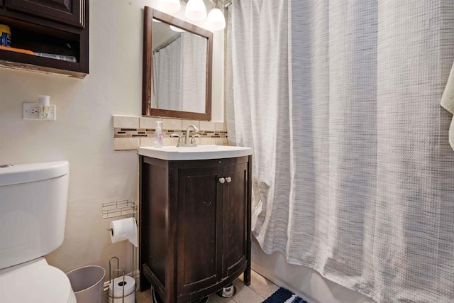 804 S 37th St, San Diego, CA 92113 - bathroom featuring vanity, toilet, shower / bath combo, and backsplash