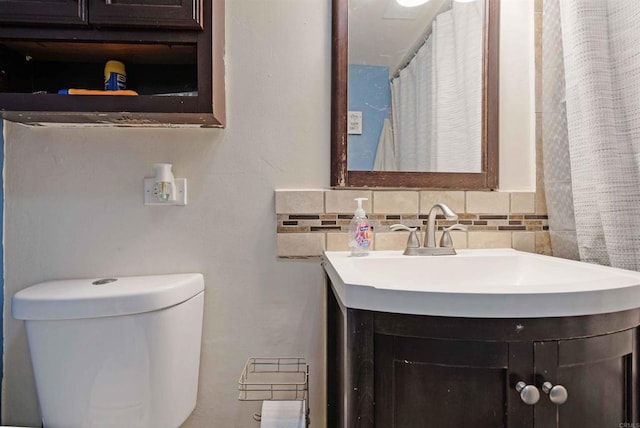 804 S 37th St, San Diego, CA 92113 - bathroom with vanity, backsplash, and toilet