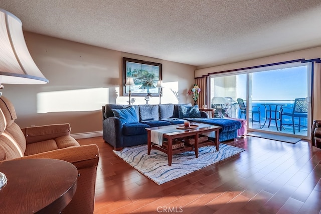 3200 La Rotonda Dr Unit 316, Rancho Palos Verdes, CA 90275 - living room with wood finished floors and a textured ceiling