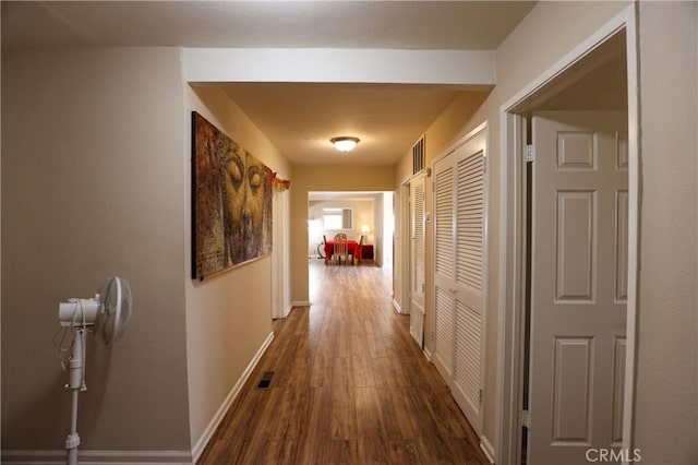 3477 Avenida Simi, Simi Valley, CA 93063 - hallway featuring visible vents, baseboards, and dark wood-style floors