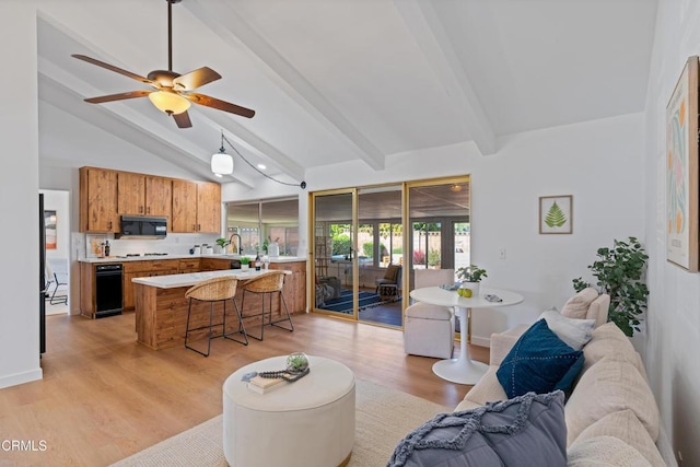 living room featuring baseboards, vaulted ceiling with beams, light wood-style floors, and ceiling fan