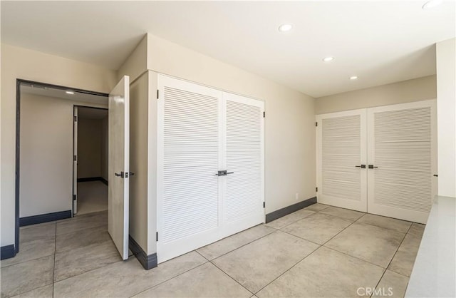 10220 Balmoral Ct, Riverside, CA 92503 - unfurnished bedroom featuring recessed lighting, baseboards, and light tile patterned flooring