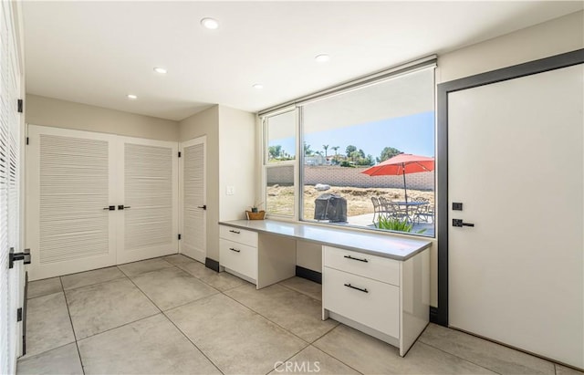 10220 Balmoral Ct, Riverside, CA 92503 - interior space with recessed lighting, built in desk, and light tile patterned flooring