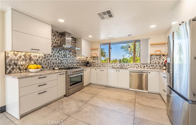 10220 Balmoral Ct, Riverside, CA 92503 - kitchen featuring stainless steel appliances, visible vents, wall chimney exhaust hood, and open shelves