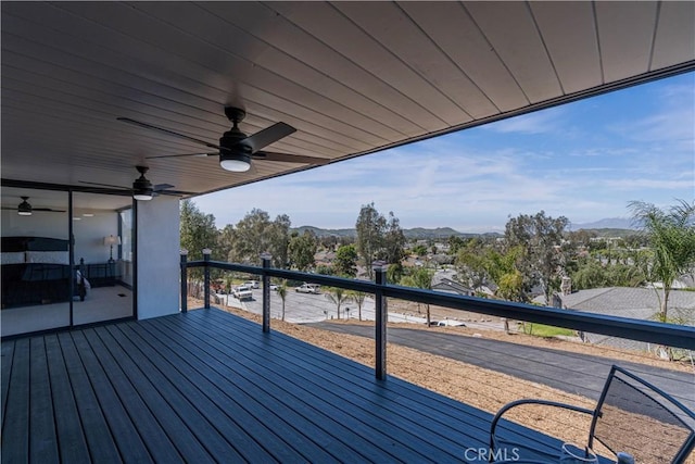 10220 Balmoral Ct, Riverside, CA 92503 - deck featuring a mountain view and ceiling fan