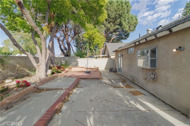 14256 Parkview Dr, Fontana, CA 92337 - fenced backyard with a patio