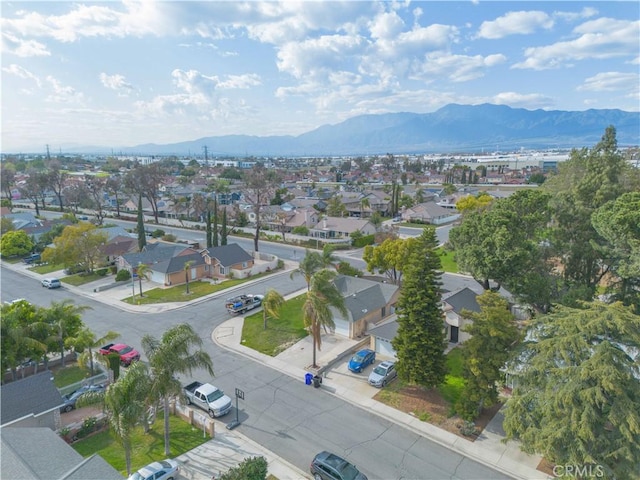 bird's eye view with a residential view and a mountain view