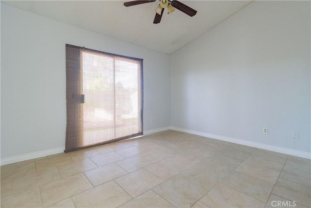empty room with baseboards, lofted ceiling, light tile patterned floors, and a ceiling fan