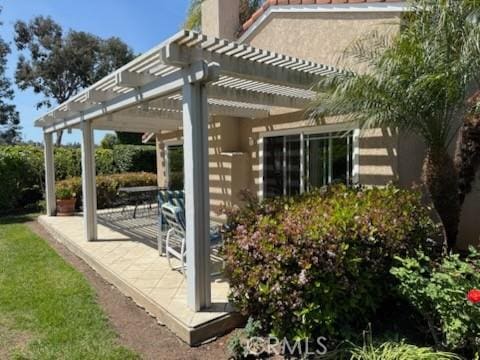 view of patio / terrace featuring a pergola