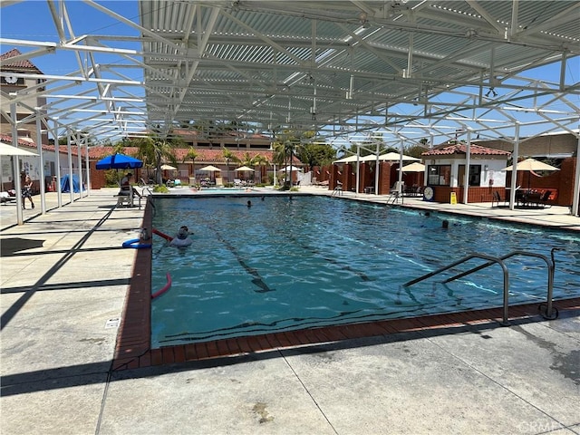 community pool featuring a patio