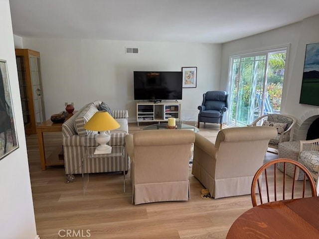 5219 Moya, Laguna Woods, CA 92637 - living room with light wood-type flooring