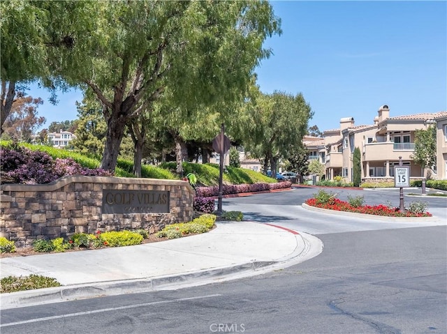 57 Plaza Brisas, San Juan Capistrano, CA 92675 - view of street featuring curbs, a residential view, and traffic signs