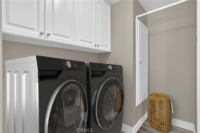 57 Plaza Brisas, San Juan Capistrano, CA 92675 - washroom with separate washer and dryer, baseboards, cabinet space, and wood finished floors