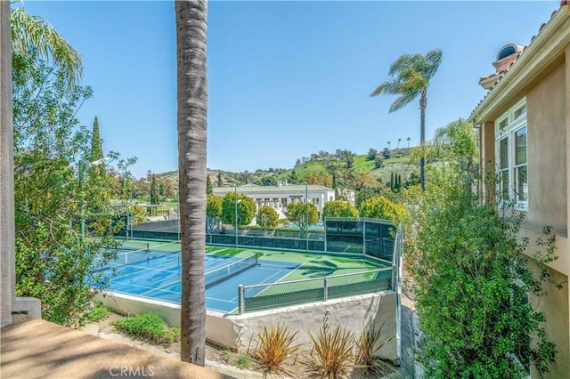 57 Plaza Brisas, San Juan Capistrano, CA 92675 - view of tennis court featuring fence