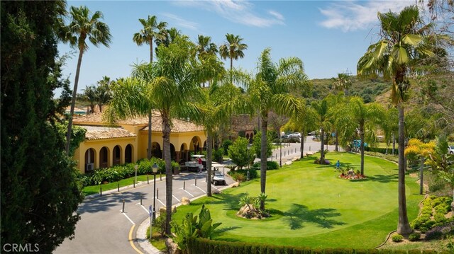 57 Plaza Brisas, San Juan Capistrano, CA 92675 - surrounding community with golf course view and a lawn