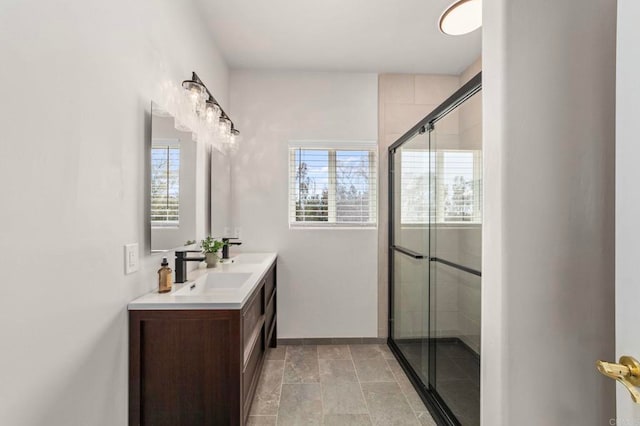 20191 Deerben Rd, Ramona, CA 92065 - bathroom featuring a shower stall, double vanity, and baseboards