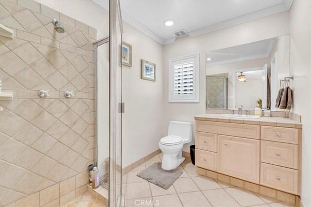 9056 Oswego St, Sunland, CA 91040 - full bath featuring a tile shower, vanity, toilet, tile patterned floors, and ornamental molding
