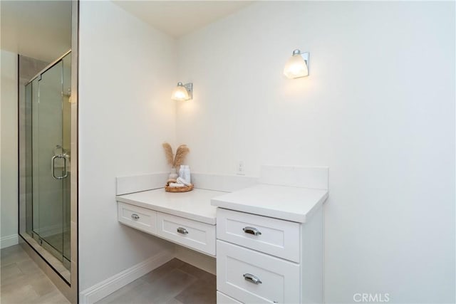 24461 Peacock St, Lake Forest, CA 92630 - bathroom featuring a stall shower and baseboards