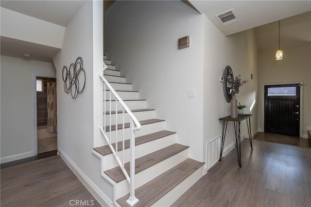 24461 Peacock St, Lake Forest, CA 92630 - staircase with wood finished floors and baseboards