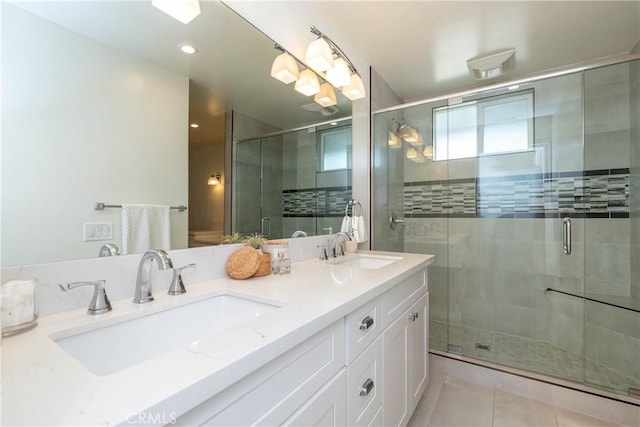 24461 Peacock St, Lake Forest, CA 92630 - full bath featuring double vanity, a shower stall, and tile patterned floors