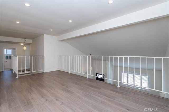 24461 Peacock St, Lake Forest, CA 92630 - empty room with wood finished floors, recessed lighting, and lofted ceiling