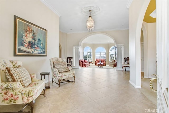 interior space featuring crown molding, light tile patterned floors, decorative columns, and arched walkways