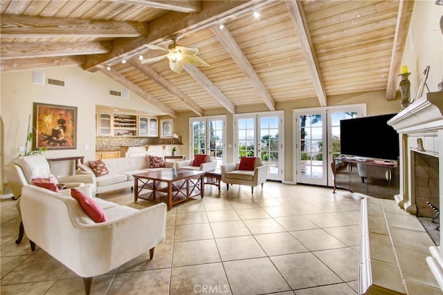 living area with wood ceiling, ceiling fan, vaulted ceiling with beams, and visible vents