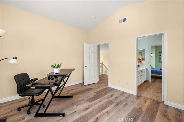14209 Wrangell Ln, Canyon Country, CA 91387 - office space with wood finished floors, high vaulted ceiling, and baseboards