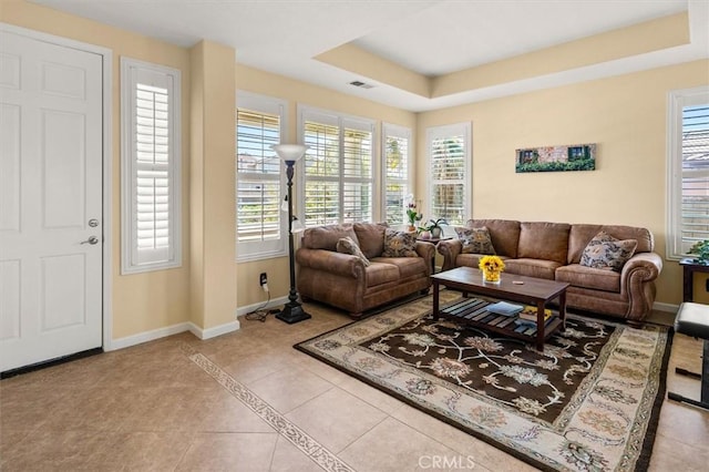 14209 Wrangell Ln, Canyon Country, CA 91387 - living area featuring baseboards, tile patterned floors, healthy amount of natural light, and a raised ceiling