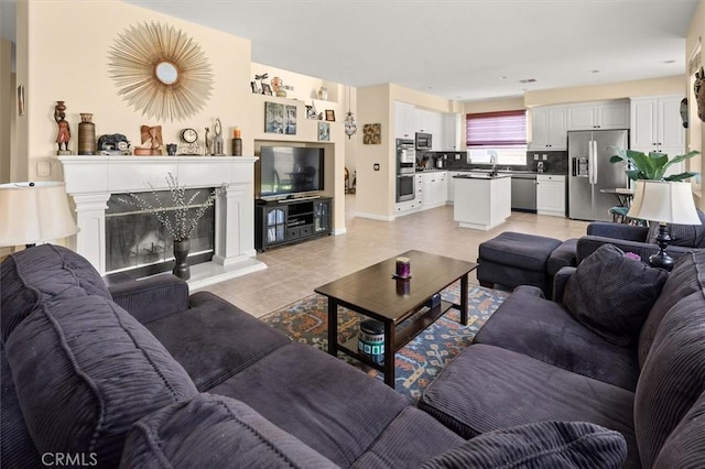 14209 Wrangell Ln, Canyon Country, CA 91387 - living area with light tile patterned floors and a premium fireplace