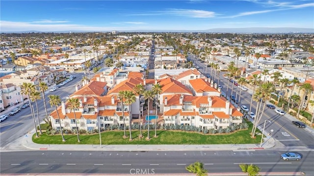1400 Pacific Coast Unit 305, Huntington Beach, CA 92648 - bird's eye view featuring a mountain view and a residential view