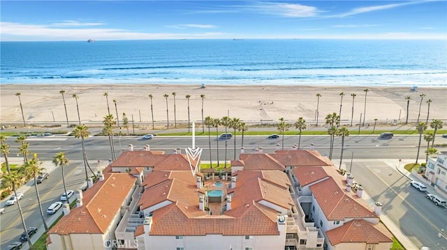 1400 Pacific Coast Unit 305, Huntington Beach, CA 92648 - bird's eye view featuring a view of the beach and a water view