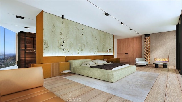 bedroom featuring wood finished floors